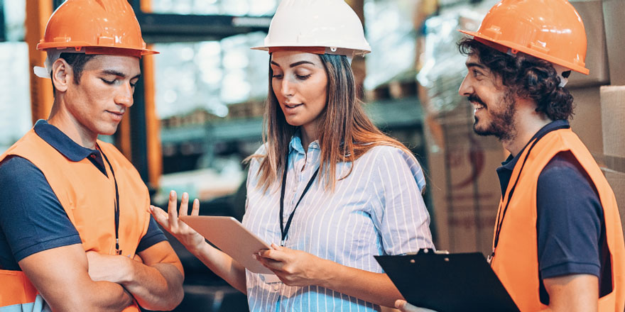 3 people with hard hats
