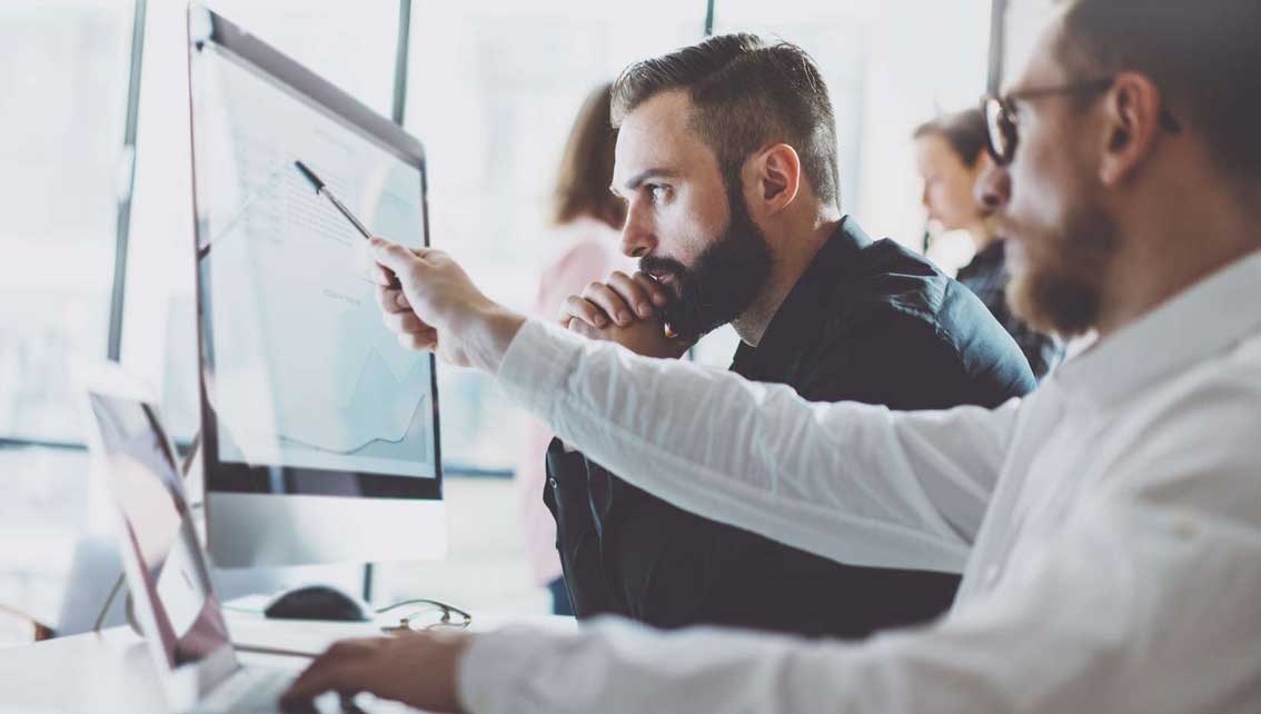 colleagues working on pc