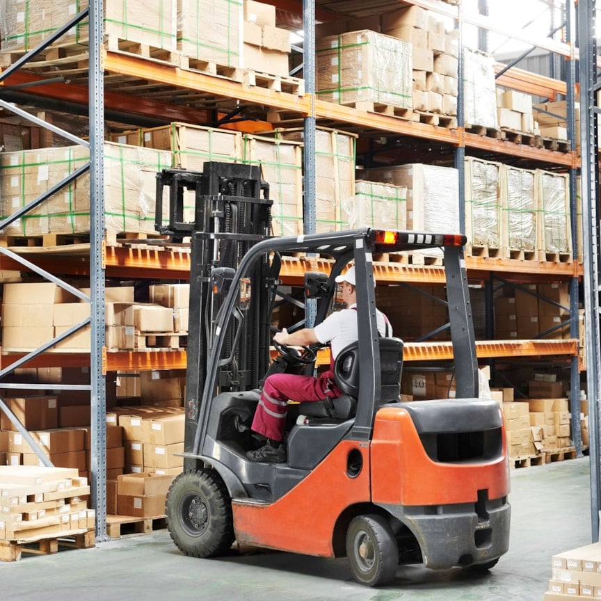 Man driving forklift