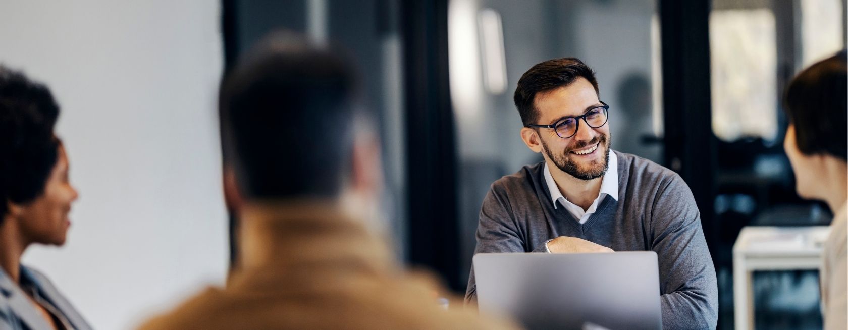 Business meeting talking about quality