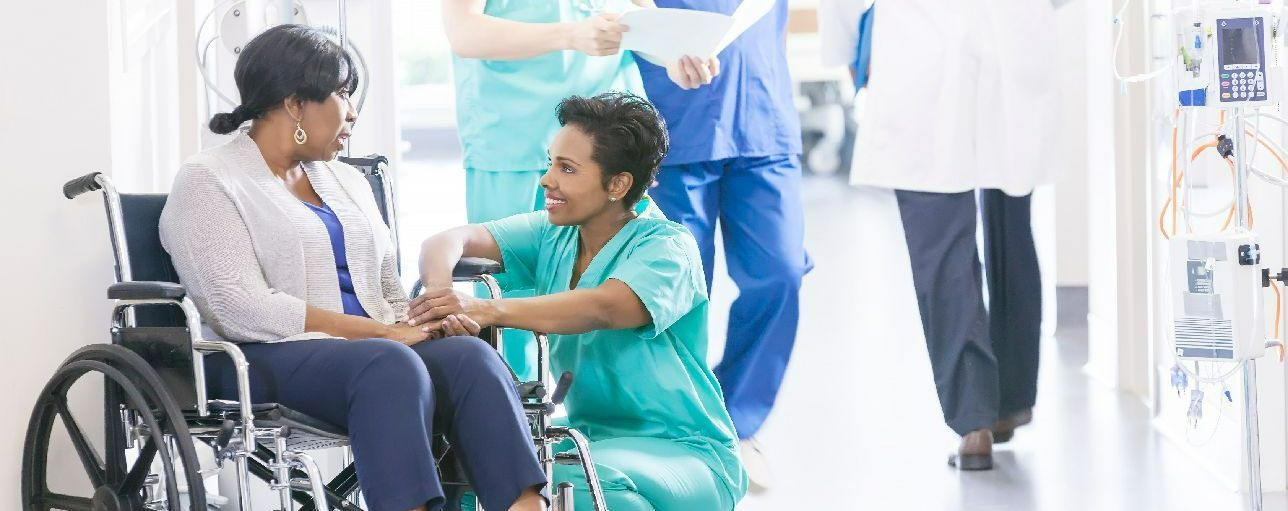 nurse_with_patient_wheelchair 2