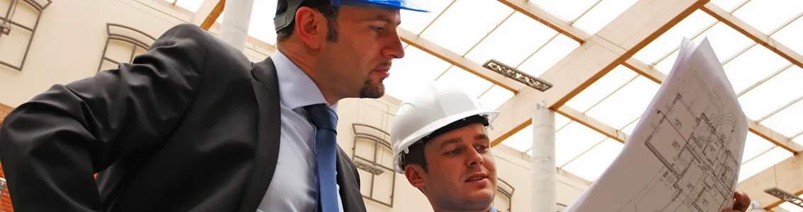 Two men in construction hats for banner image of Modern Safety Management Course